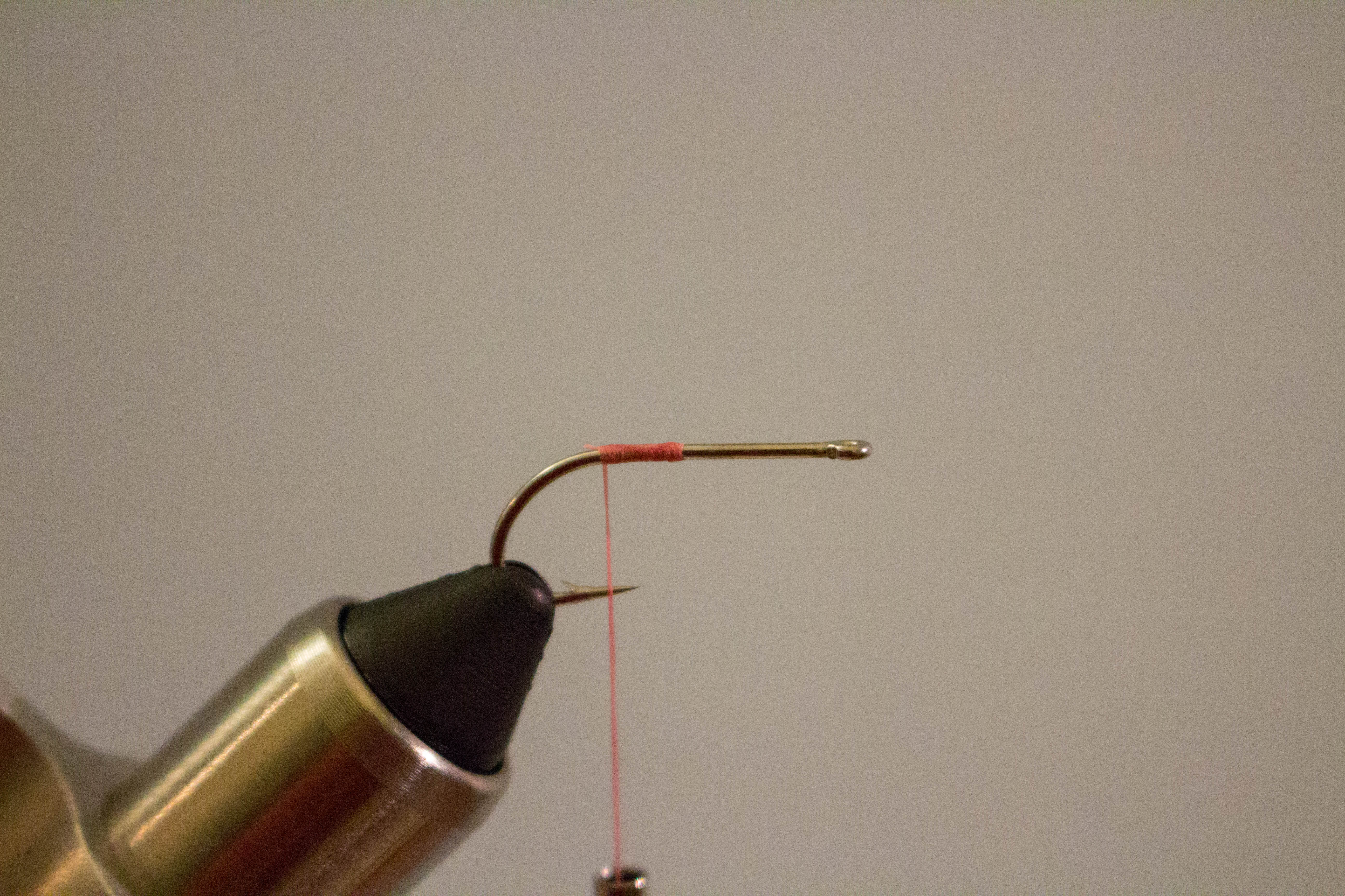Gotcha - Step 1: Tie in your thread and lay a thread base on the back half o…