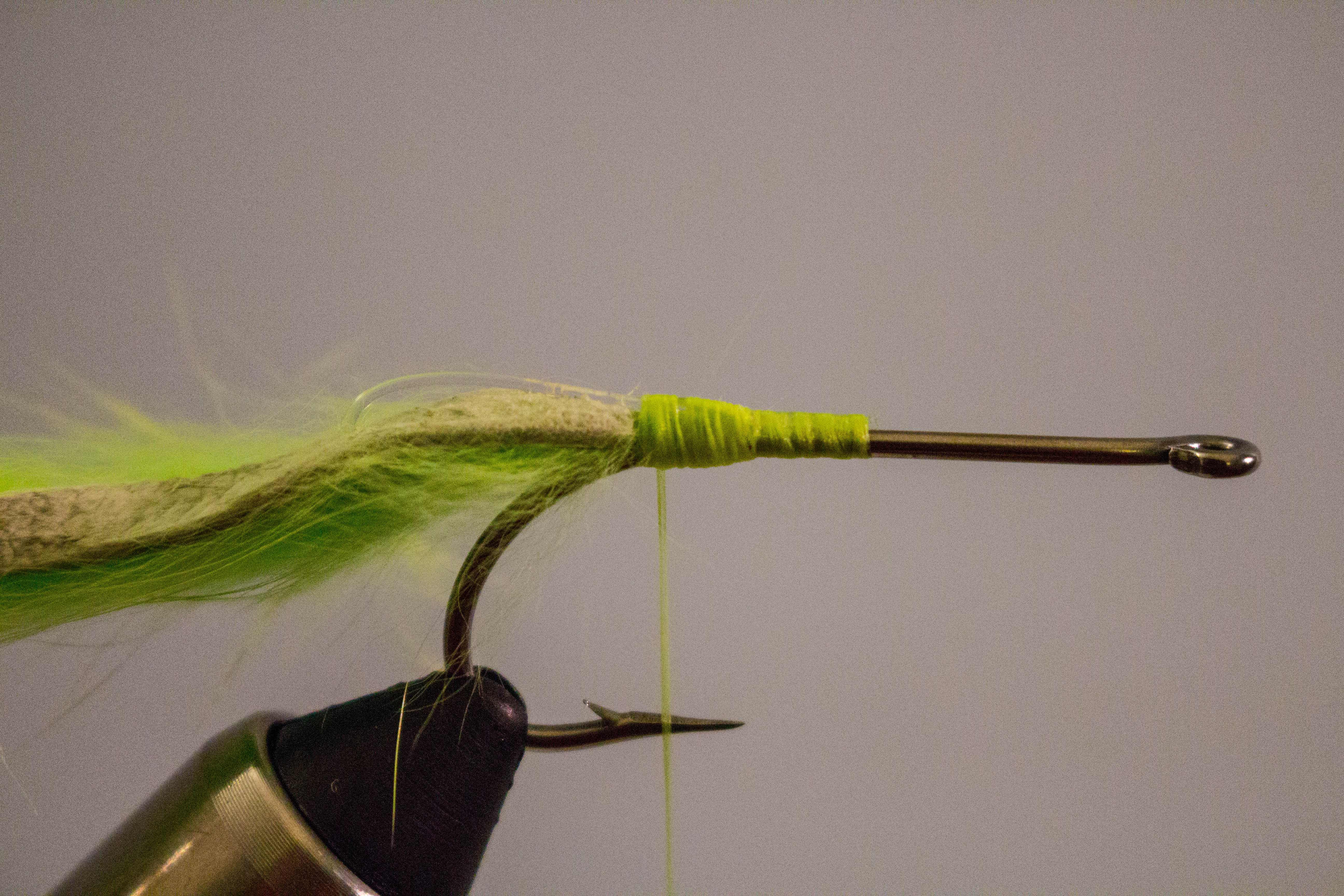 Tarpon Bunny - Step 4: Poke a hole in the bottom of the rabbit strip with a bodkin…